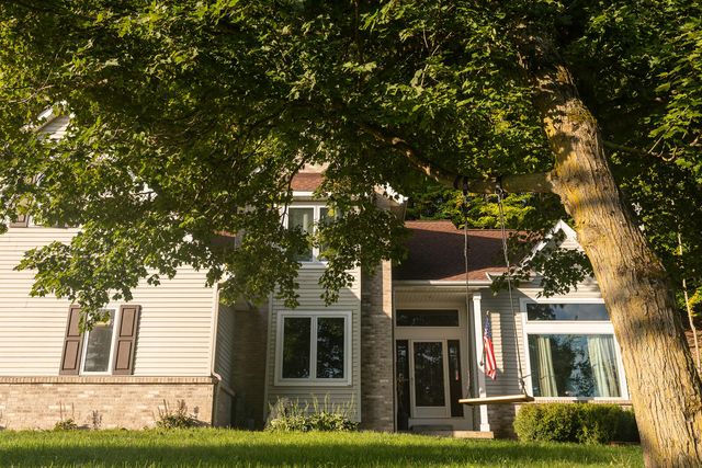 8824 Grand River Drive SE, Ada, MI 49301