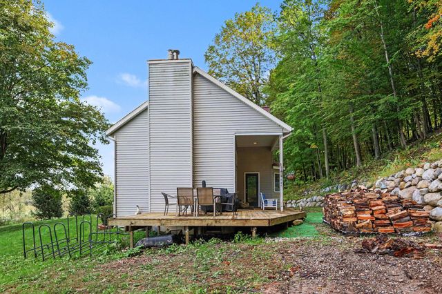 8824 Grand River Drive SE, Ada, MI 49301