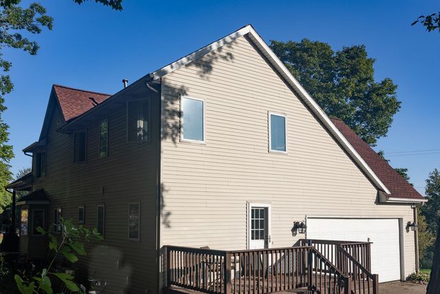 8824 Grand River Drive SE, Ada, MI 49301