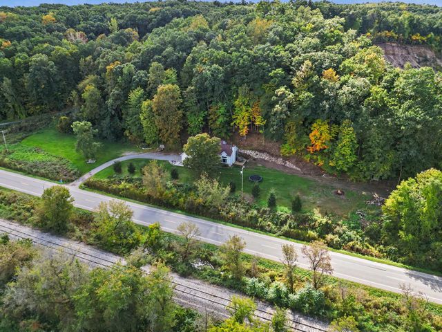 8824 Grand River Drive SE, Ada, MI 49301