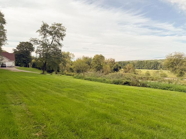 8824 Grand River Drive SE, Ada, MI 49301