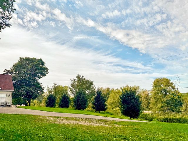 8824 Grand River Drive SE, Ada, MI 49301