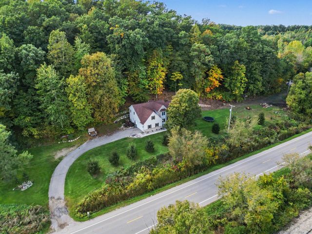 8824 Grand River Drive SE, Ada, MI 49301