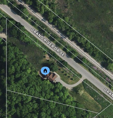 8824 Grand River Drive SE, Ada, MI 49301