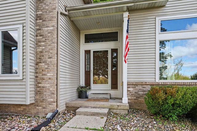 8824 Grand River Drive SE, Ada, MI 49301