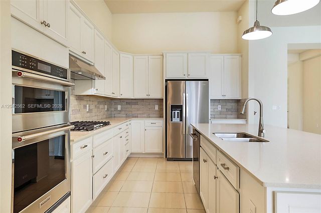 9117 Balsamo Dr, Palm Beach Gardens, FL 33412