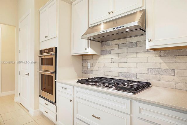 9117 Balsamo Dr, Palm Beach Gardens, FL 33412