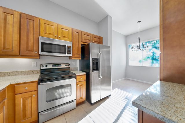 3500 OAKS CLUBHOUSE Drive 102, Pompano Beach, FL 33069