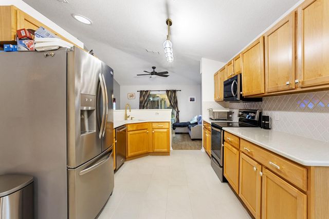 1030 TAWNY EAGLE DRIVE, Groveland, FL 34736