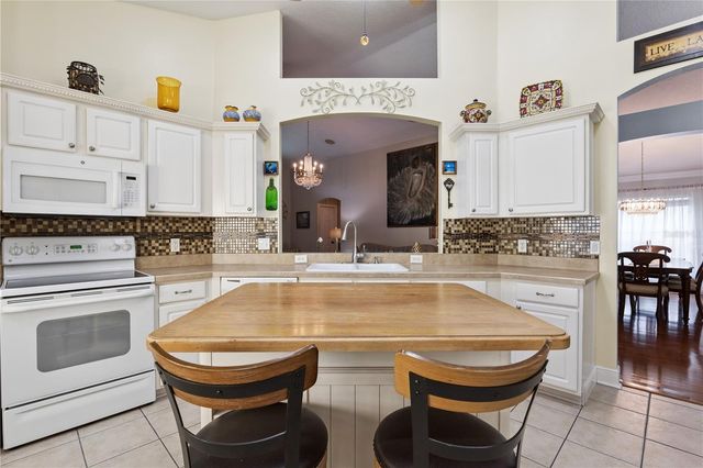 9943 HERON POINTE DRIVE, Orlando, FL 32832