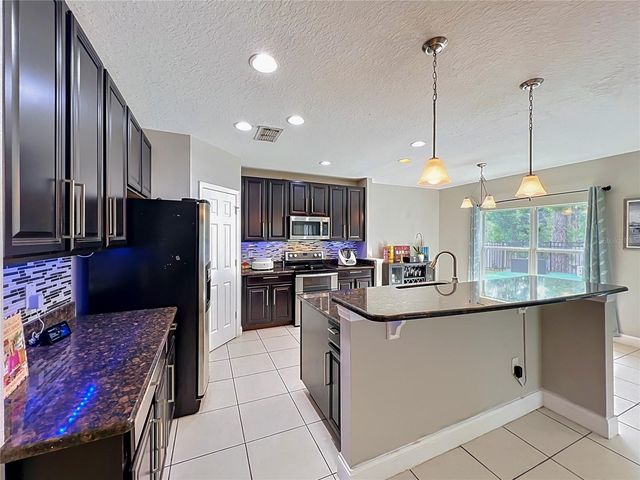 10672 CABBAGE TREE LOOP, Orlando, FL 32825