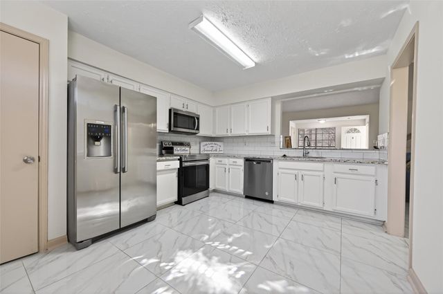 10726 Village Trail Drive, Houston, TX 77065