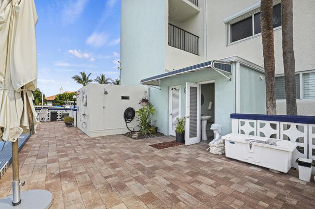 109 Paradise Harbour Boulevard 514 + Boat Slips 4 & 5, North Palm Beach, FL 33408