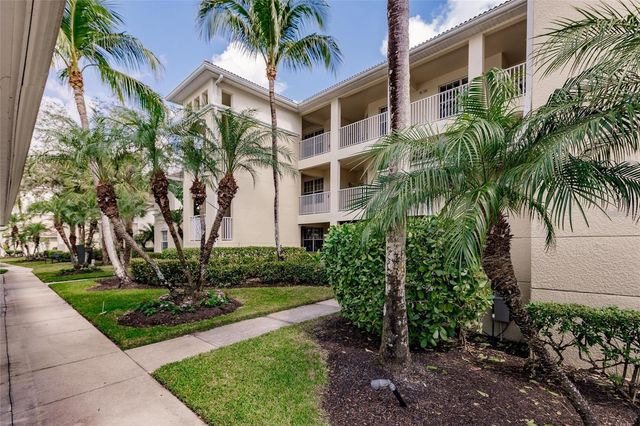 1878 TARPON BAY DRIVE S 102, Naples, FL 34119