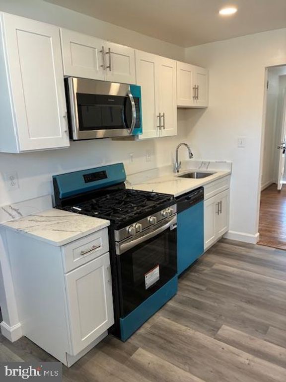 Image 2 of property listing at 6908 DIGBY RD, Baltimore, MD 21207