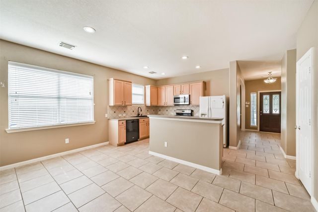12855 Whistling Springs Drive, Humble, TX 77346
