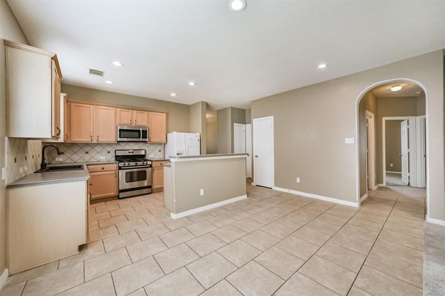 12855 Whistling Springs Drive, Humble, TX 77346