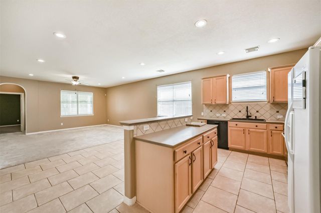 12855 Whistling Springs Drive, Humble, TX 77346