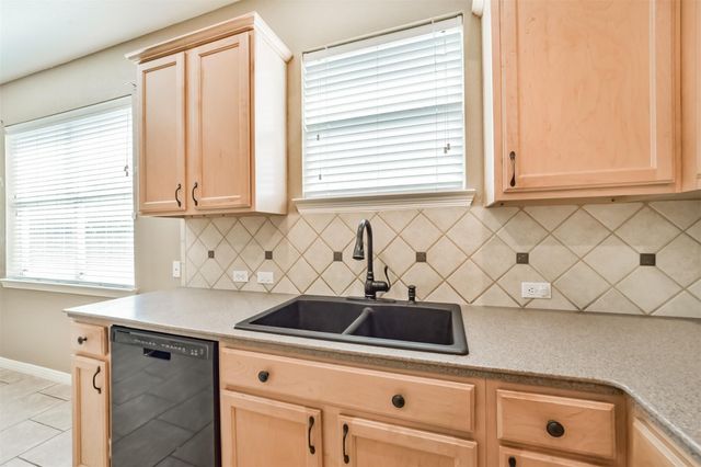 12855 Whistling Springs Drive, Humble, TX 77346