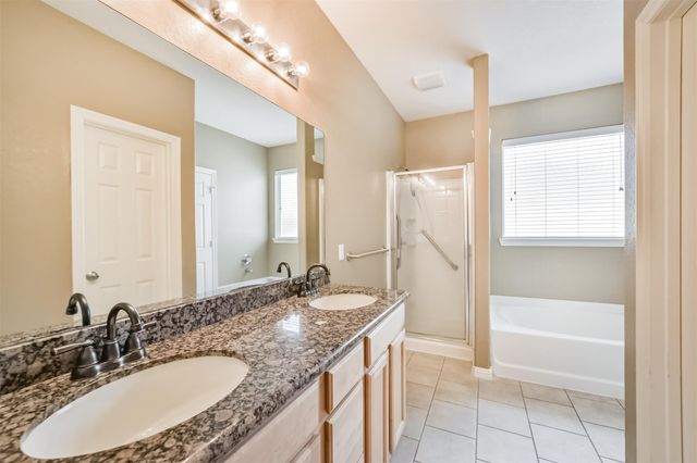 12855 Whistling Springs Drive, Humble, TX 77346