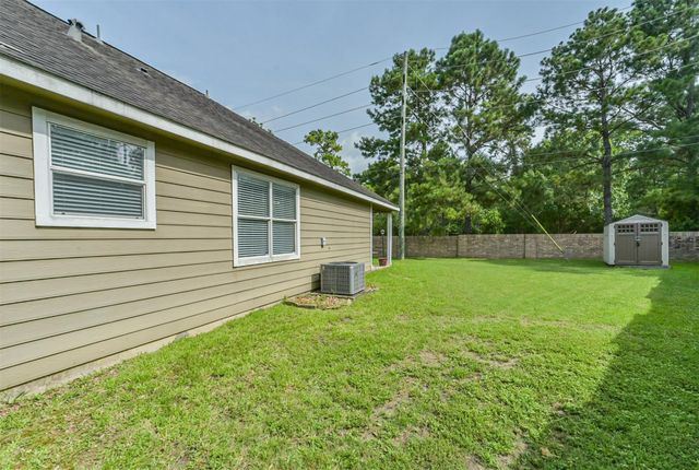 12855 Whistling Springs Drive, Humble, TX 77346