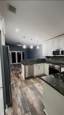 3965 Torres Circle, West Palm Beach, FL 33409