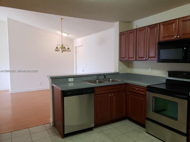 10105 W Sunrise Blvd 303, Plantation, FL 33322