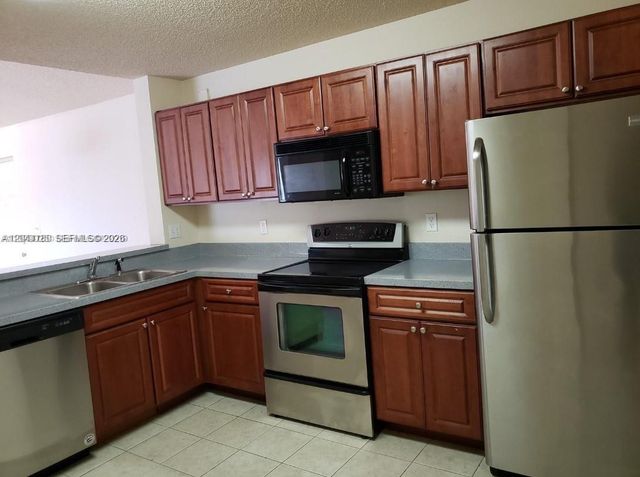 10105 W Sunrise Blvd 303, Plantation, FL 33322