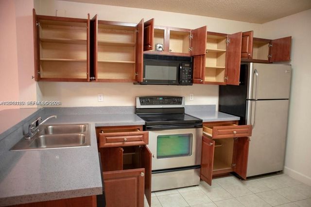 10105 W Sunrise Blvd 303, Plantation, FL 33322