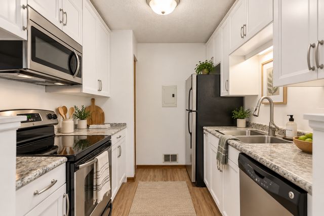 1728 Pleasant Street E, Lauderdale, MN 55113