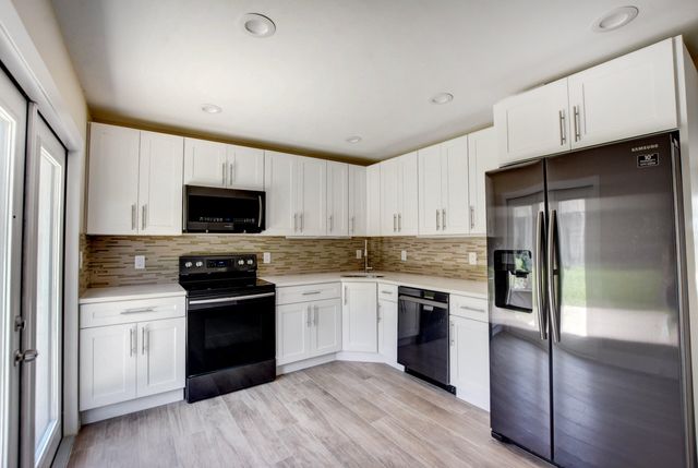 9188 Birmingham Drive, Palm Beach Gardens, FL 33410