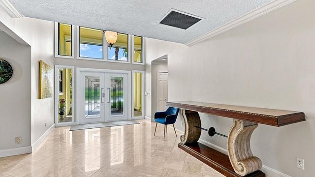 1 WYCLIFF Road, Palm Beach Gardens, FL 33418