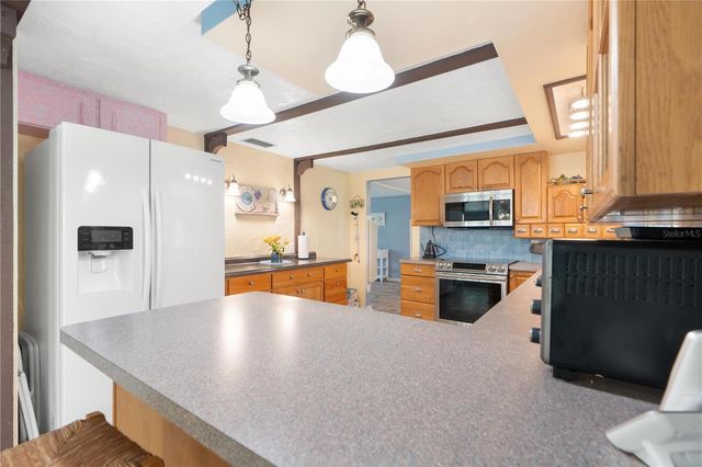 8021 WILDFLOWER ROW, Hudson, FL 34667