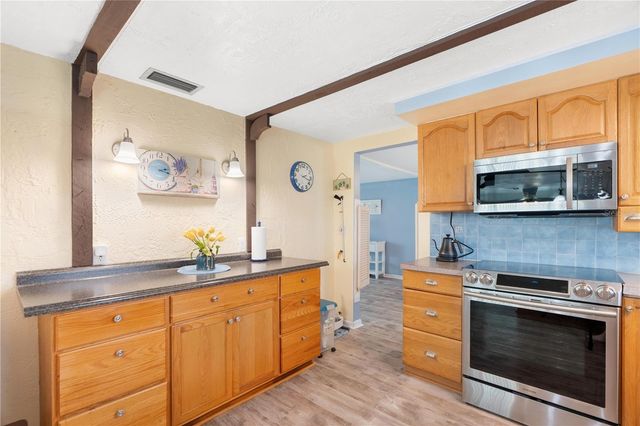 8021 WILDFLOWER ROW, Hudson, FL 34667