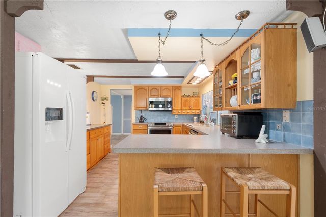 8021 WILDFLOWER ROW, Hudson, FL 34667