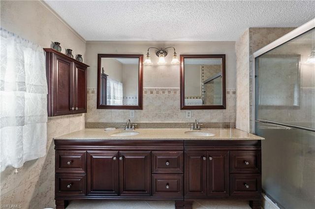 214 Riverwood RD, Naples, FL 34114