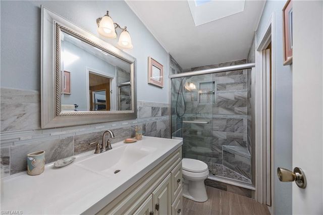 214 Riverwood RD, Naples, FL 34114