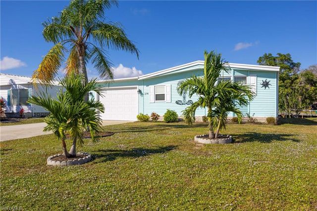 214 Riverwood RD, Naples, FL 34114