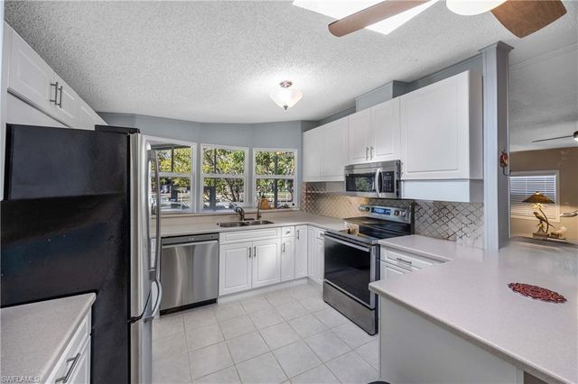 214 Riverwood RD, Naples, FL 34114