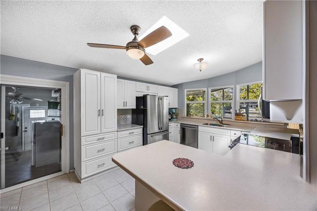 214 Riverwood RD, Naples, FL 34114
