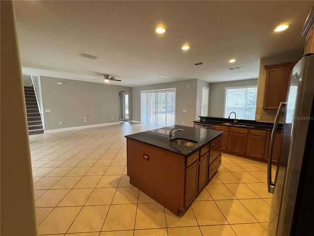 1042 SPINNING WHEEL DRIVE, Apopka, FL 32712