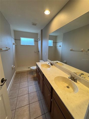 1042 SPINNING WHEEL DRIVE, Apopka, FL 32712