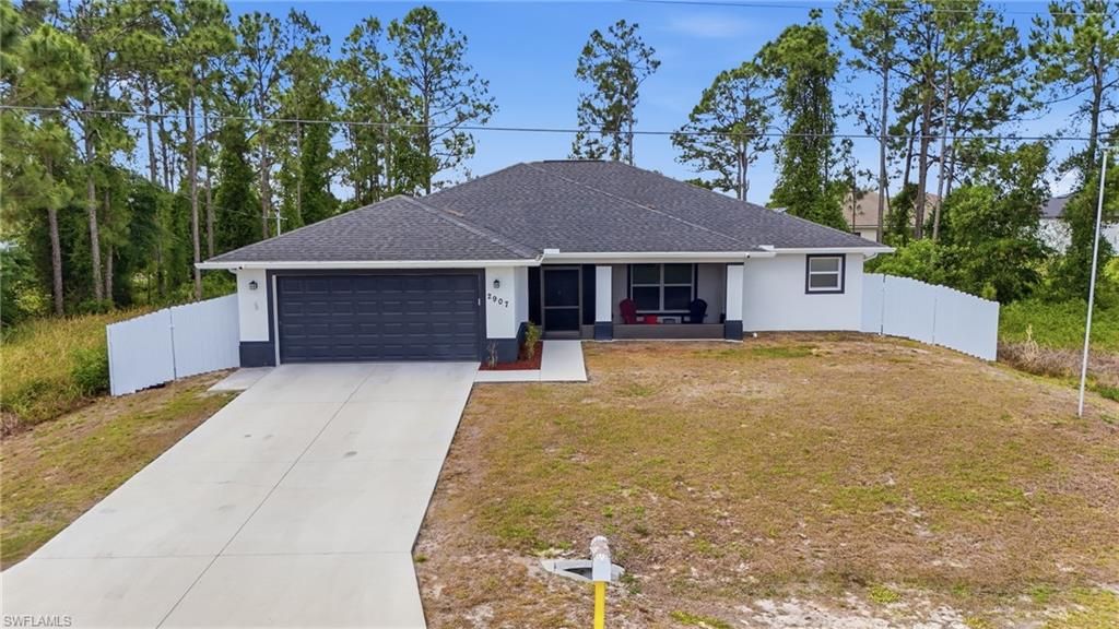 2907 18th ST SW, LEHIGH ACRES, FL 33976 — photo 2
