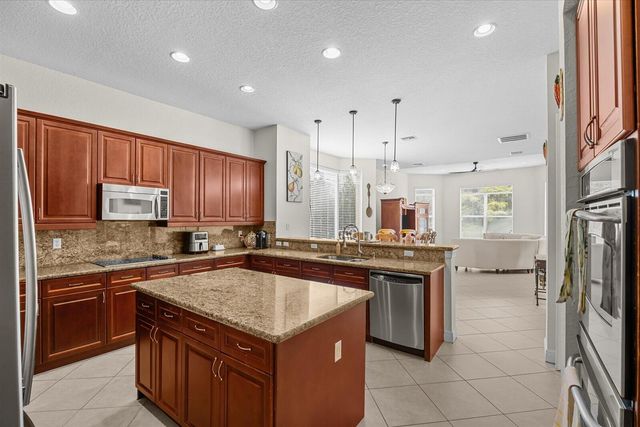 10303 SW Fiddlers Way, Palm City, FL 34990