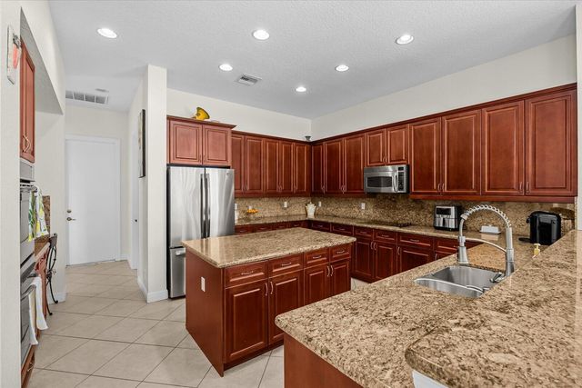 10303 SW Fiddlers Way, Palm City, FL 34990