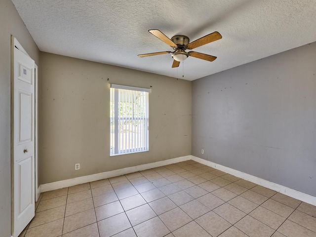 1407 SE Grapeland Avenue, Port St. Lucie, FL 34952