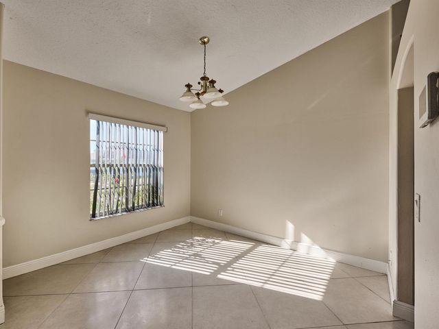 1407 SE Grapeland Avenue, Port St. Lucie, FL 34952
