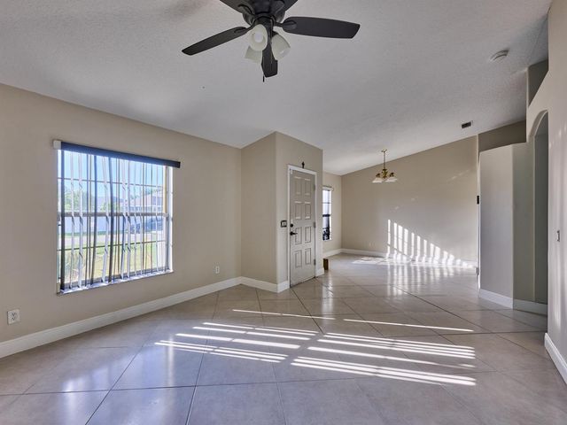 1407 SE Grapeland Avenue, Port St. Lucie, FL 34952