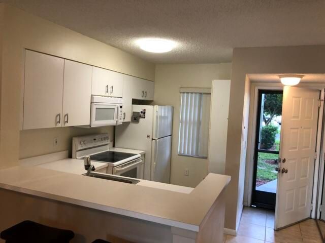 2236 N CYPRESS BEND Drive 106, Pompano Beach, FL 33069