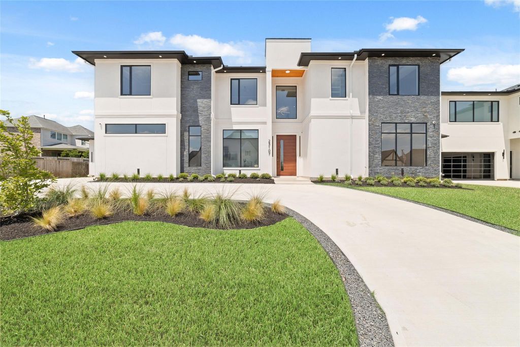 23107 Vista De Tres Lagos Drive, Spring, TX 77389